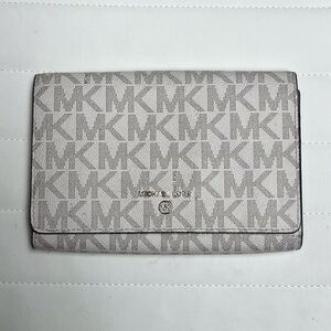 Michael Kors Wallet. EUC- missing removal strap to make into a small purse